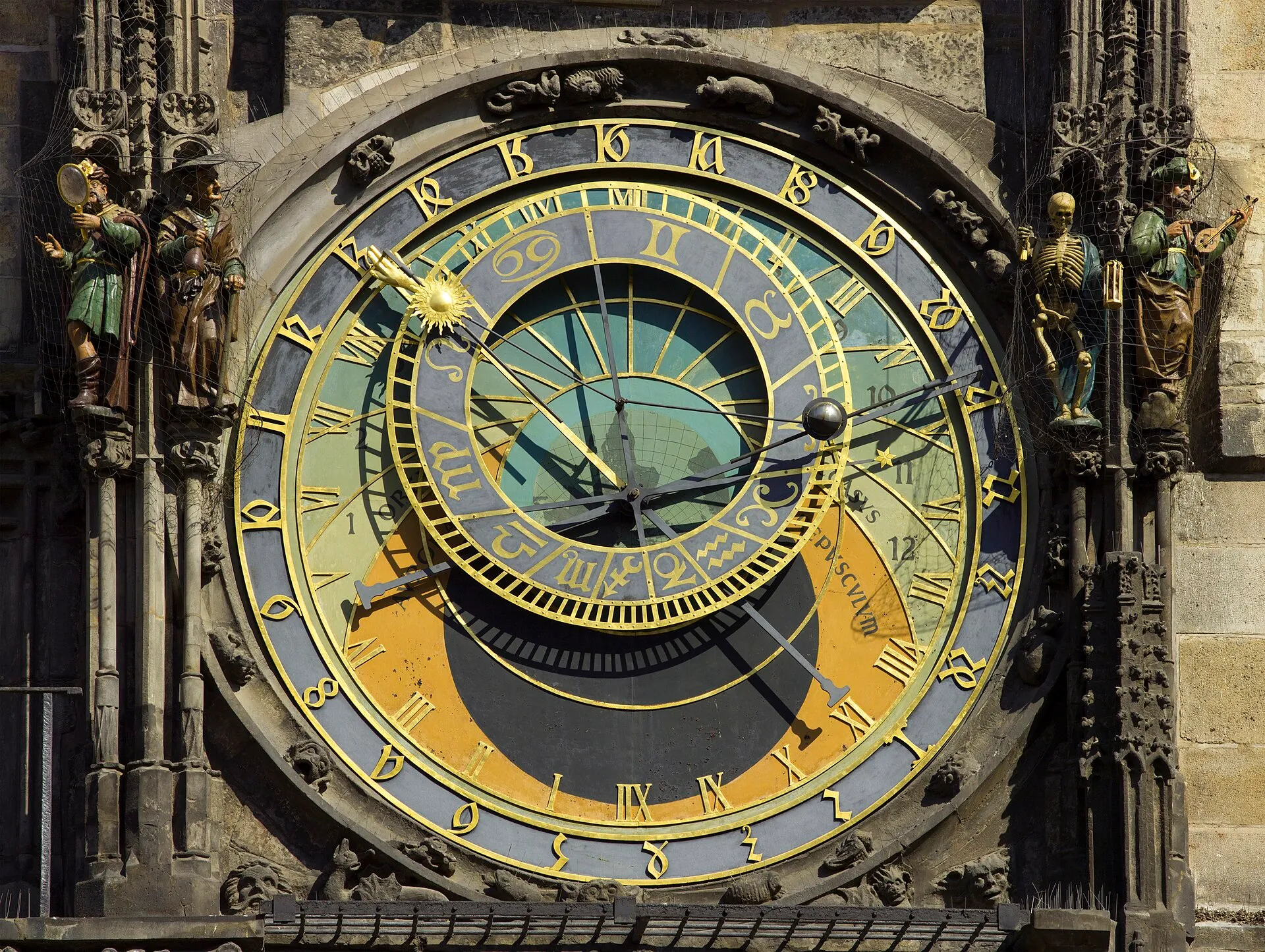 The ornate astronomical clock face in Prague, with rings for hours, the zodiac and the sun.